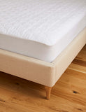 Sleep Solutions quilted waterproof mattress protector, imported from the UK