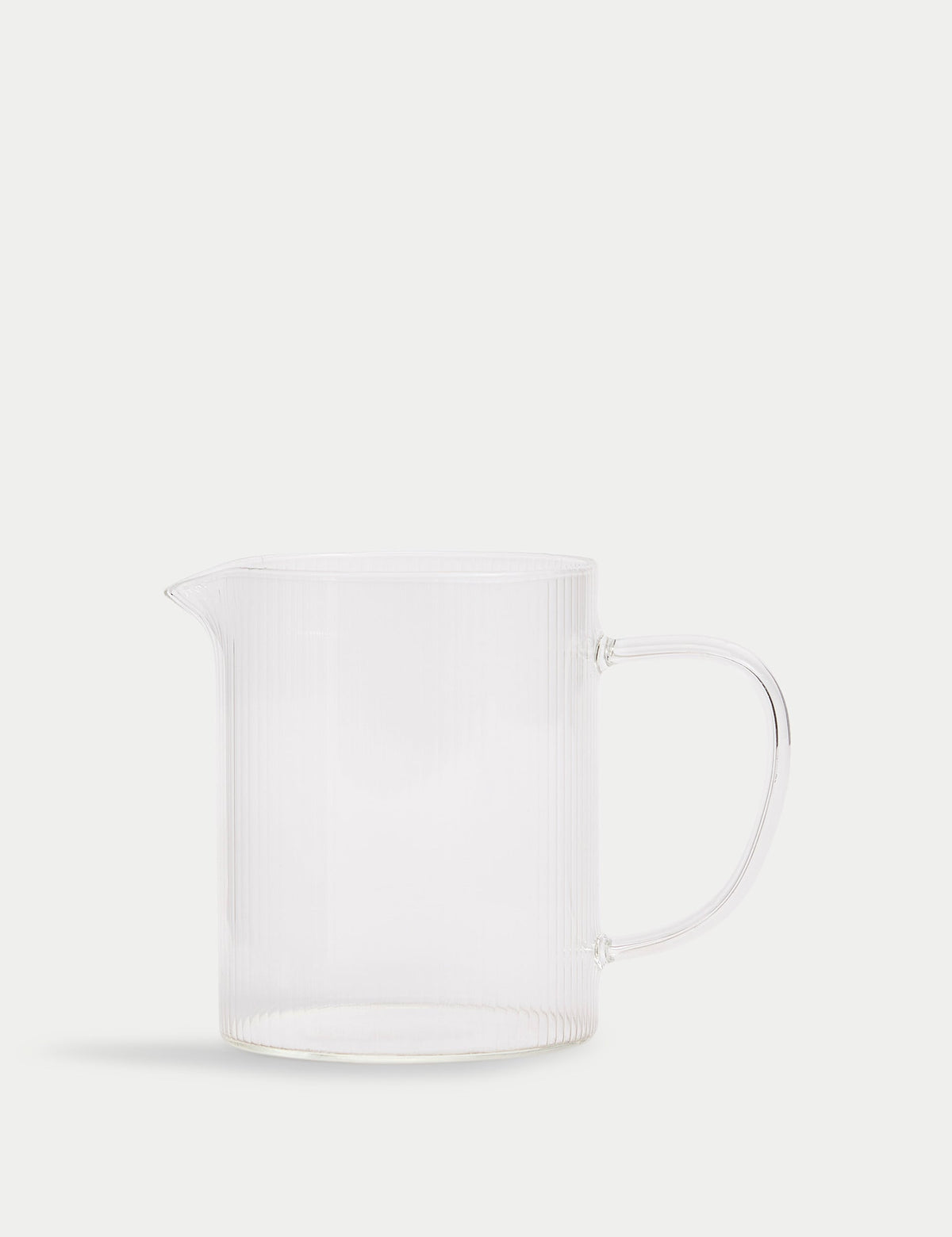 Ribbed glass milk jug, imported from the UK
