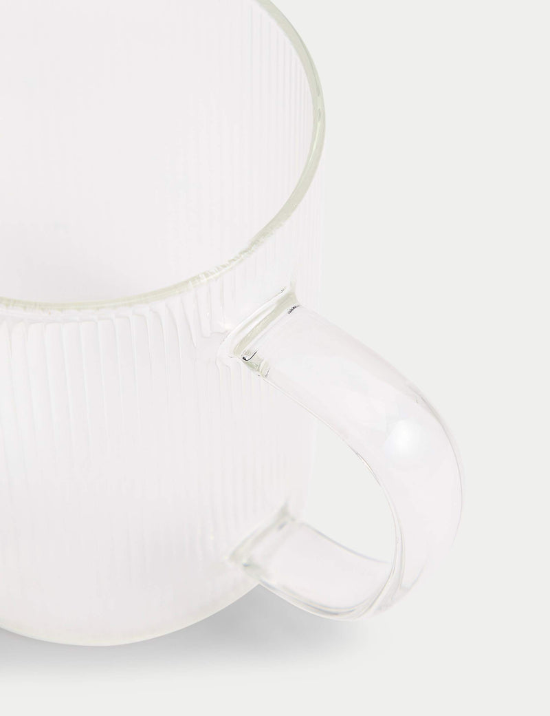 Ribbed glass milk jug, imported from the UK