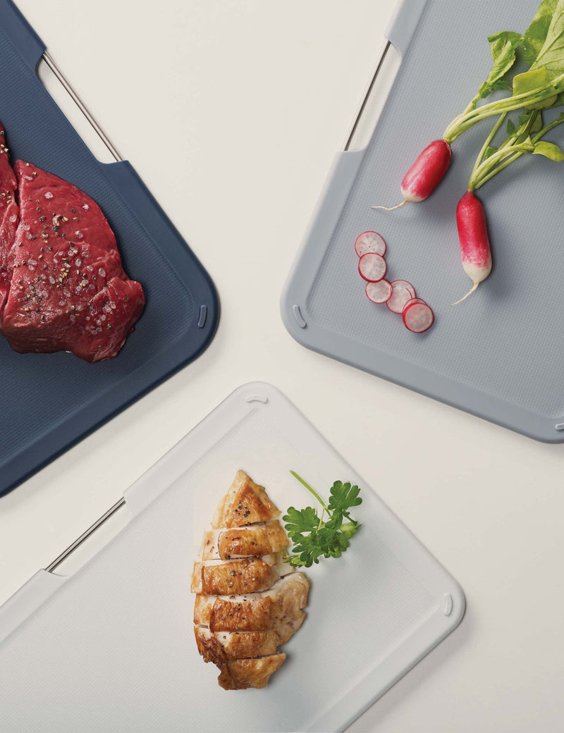 Joseph Joseph set of 3 plastic chopping boards with storage stand (British brand)