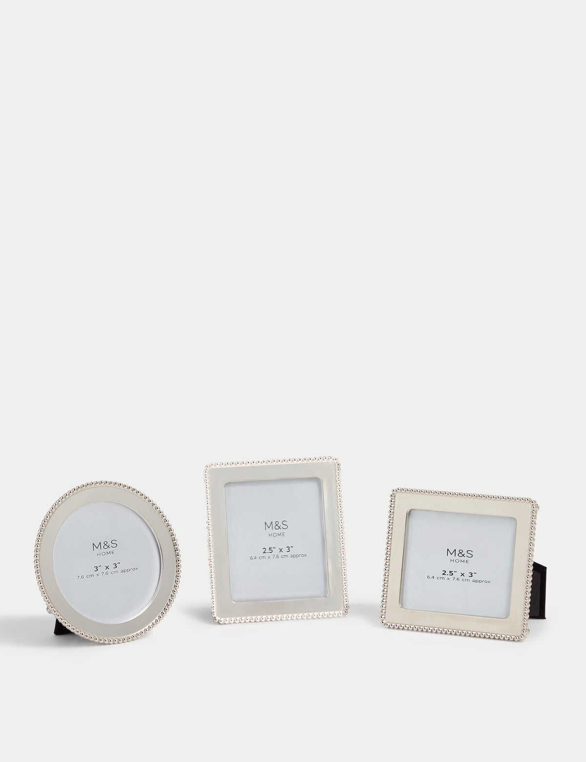 Set of three silver photo frames with square, rectangular, and circular shapes (British brand)