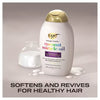 OGX Damage Remedy+ Coconut Oil Shampoo bottle 385ml, imported from the UK
