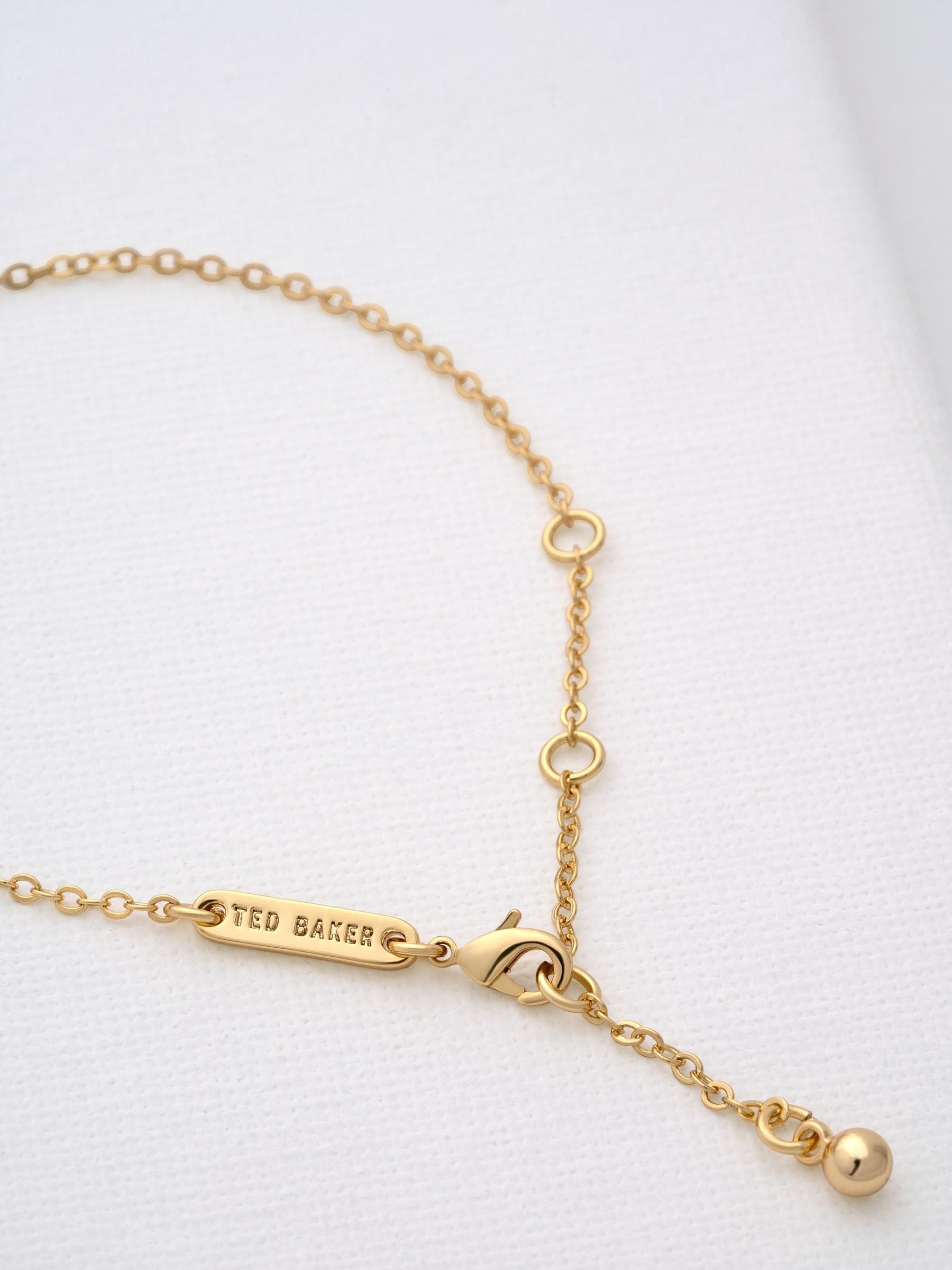 Ted Baker gold tone clear crystal heart adjustable bracelet (British brand)