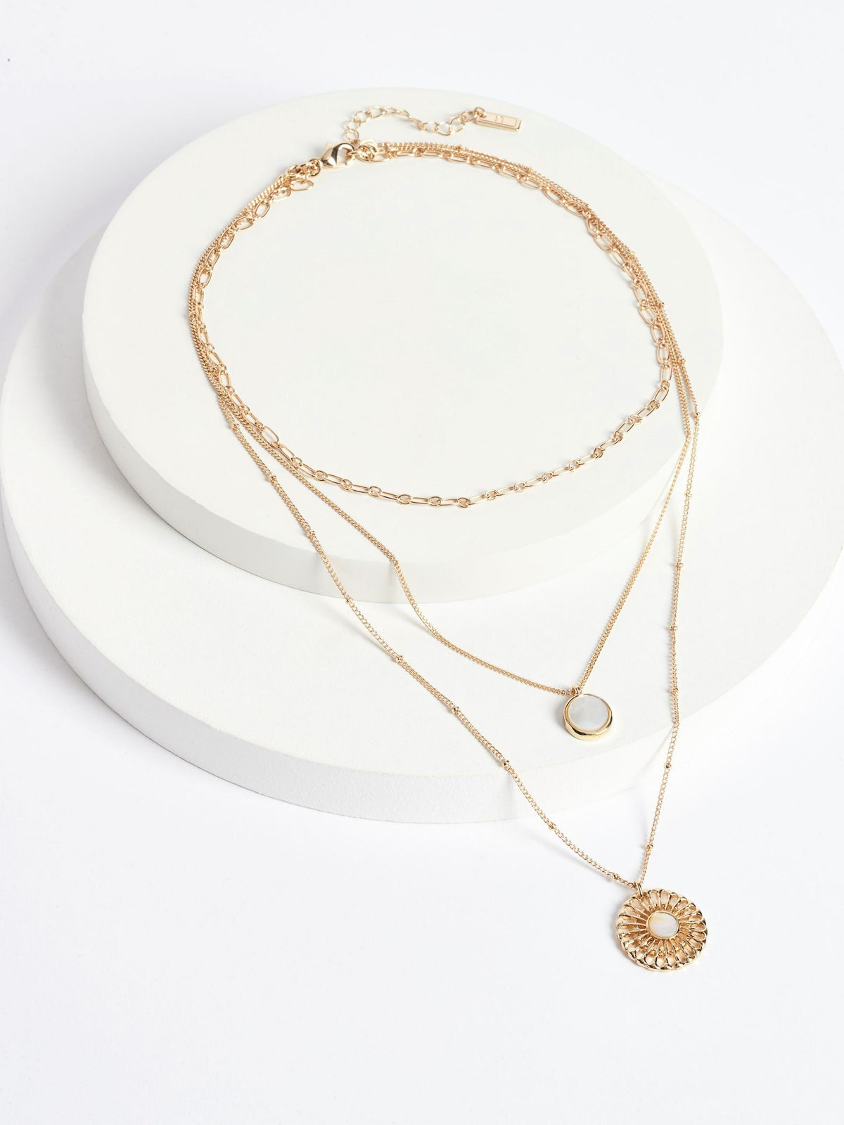Gold tone floral 3 row necklace with shell pendant, UK version