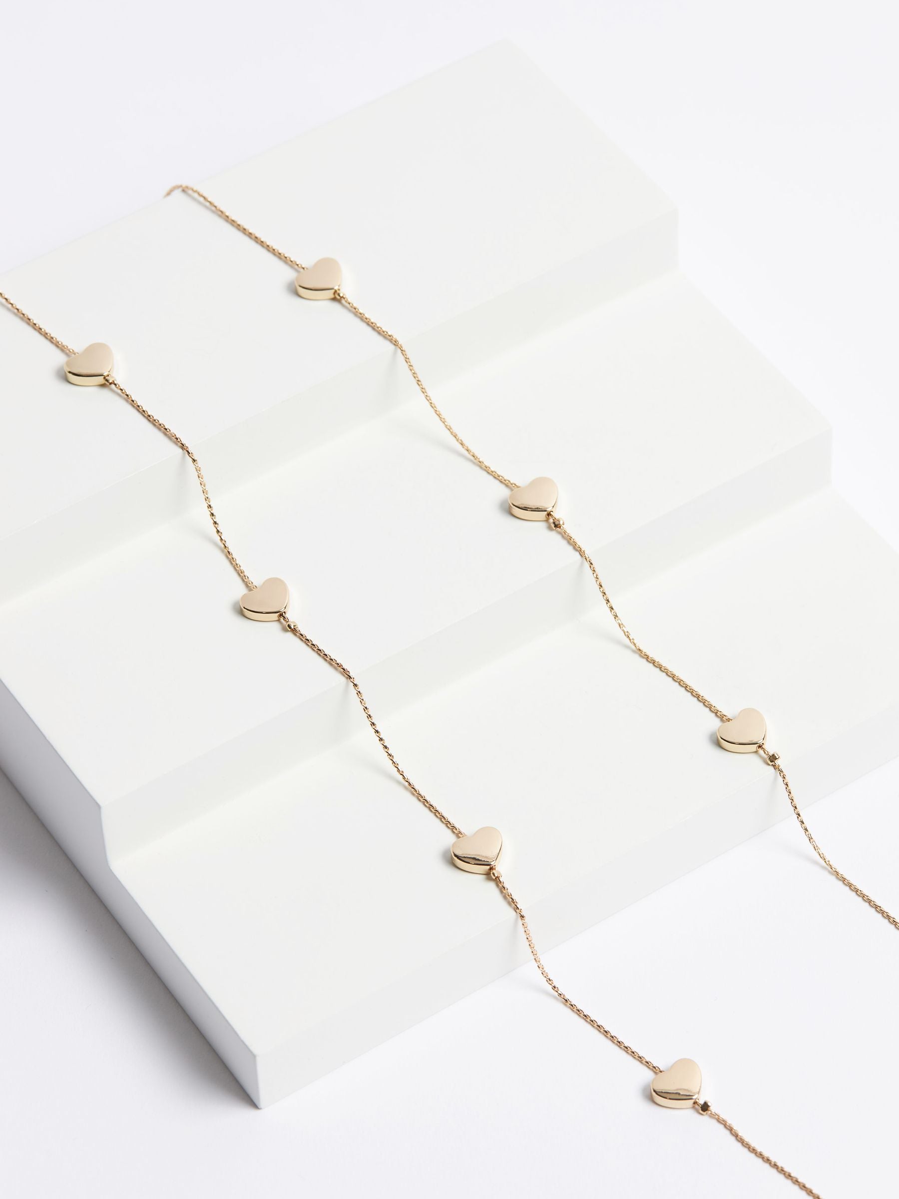 Gold tone heart long rope necklace, UK version