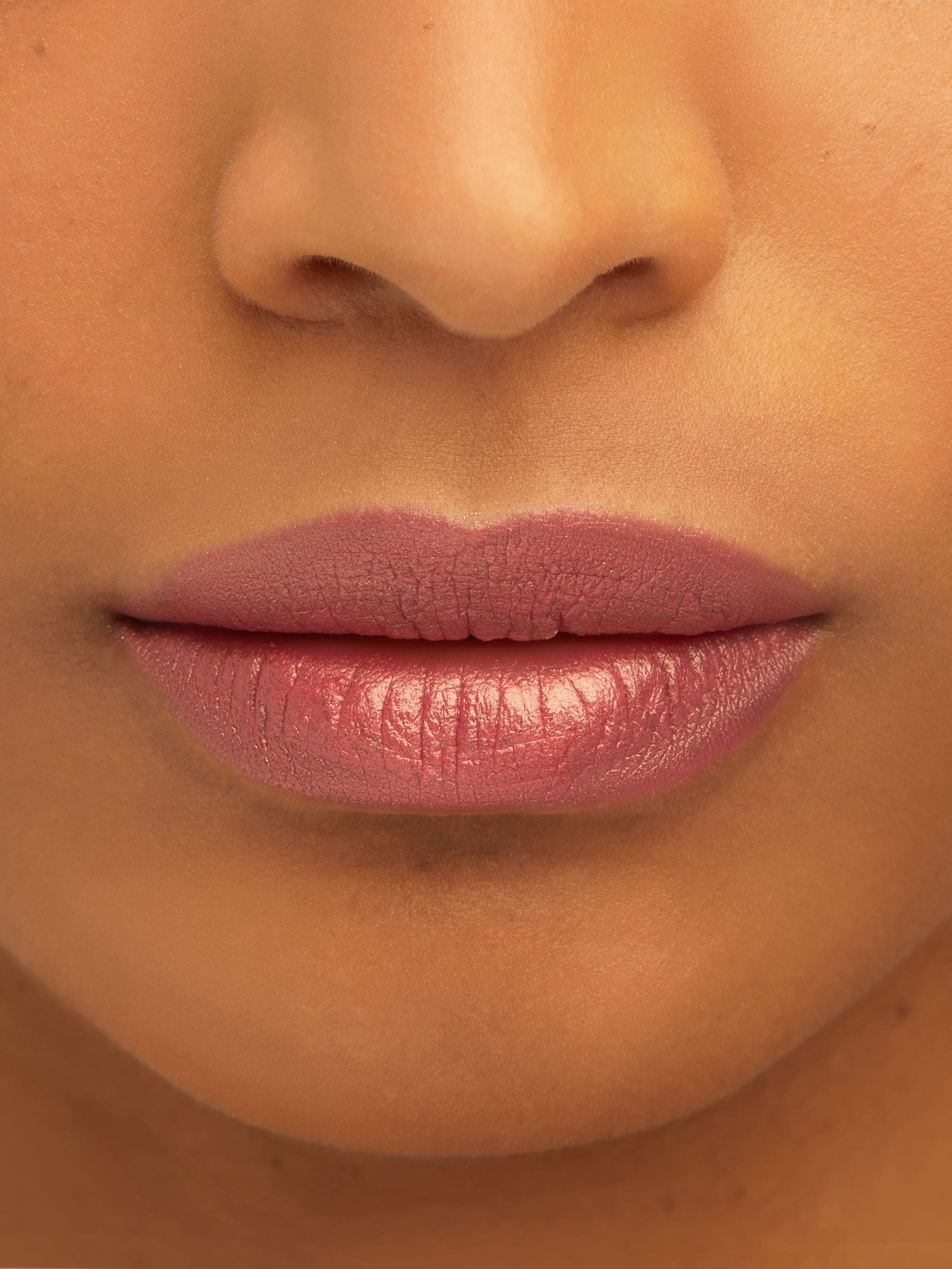 Metallic pink prosecco lipstick (British brand)