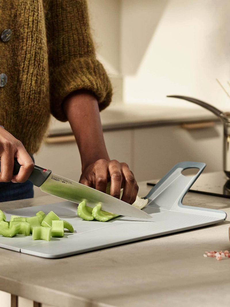 Joseph Joseph Blue Chop2Pot Plus folding chopping board, UK version