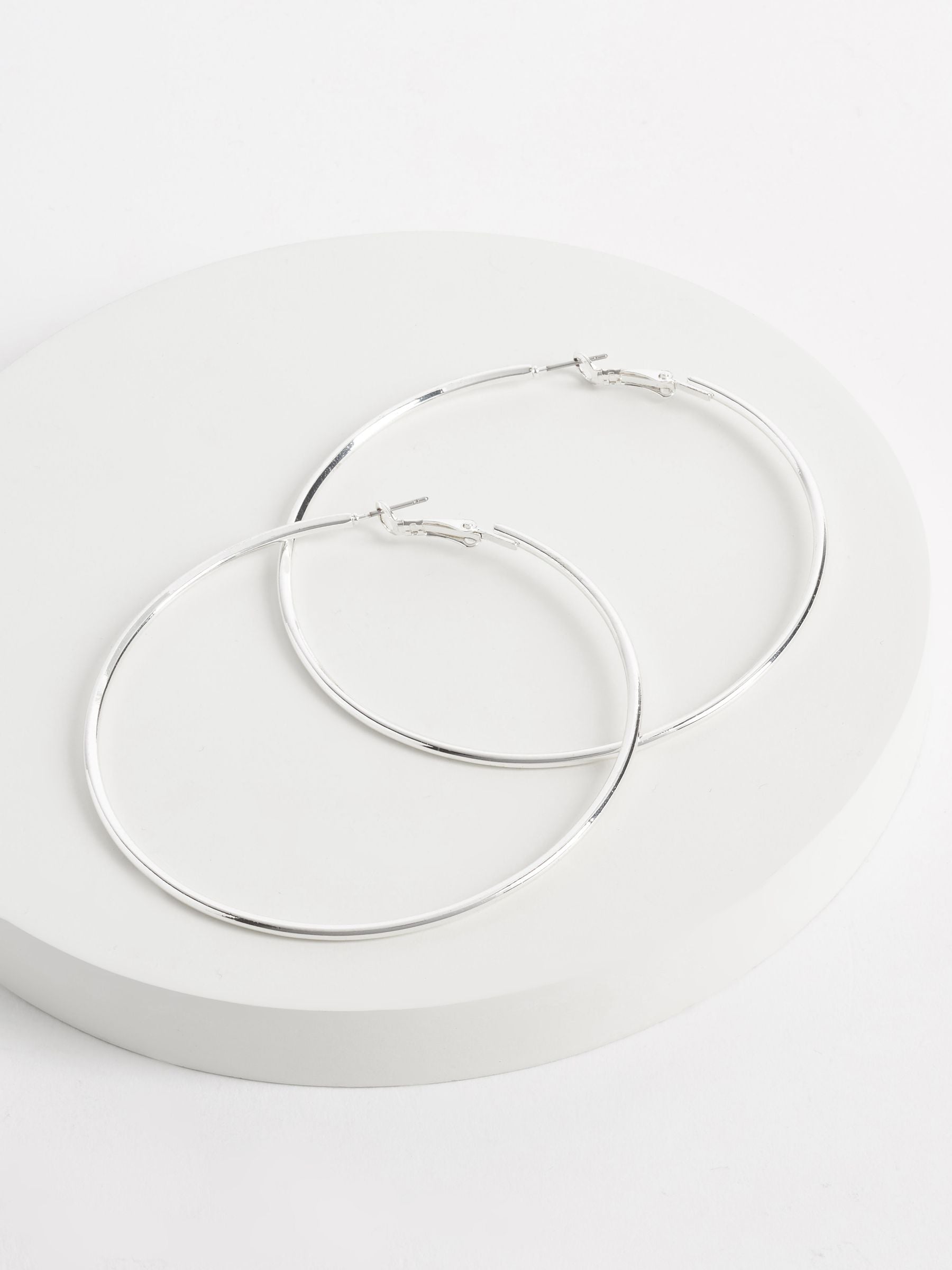 Silver tone oversized hoop earrings (British brand)