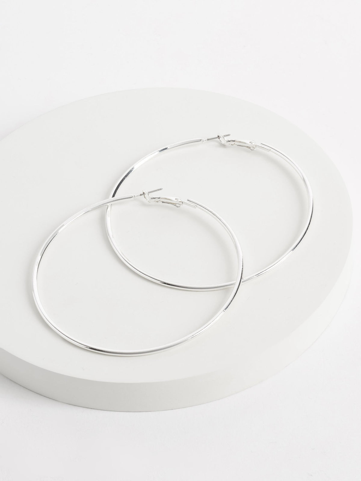 Silver tone oversized hoop earrings (British brand)
