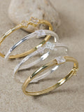 Jon Richard gold plated pave clover bangle, UK version