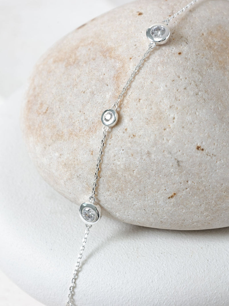 Silver-Plated Cubic Zirconia Bezel Station Bracelet with Lobster Clasp 8 Inch