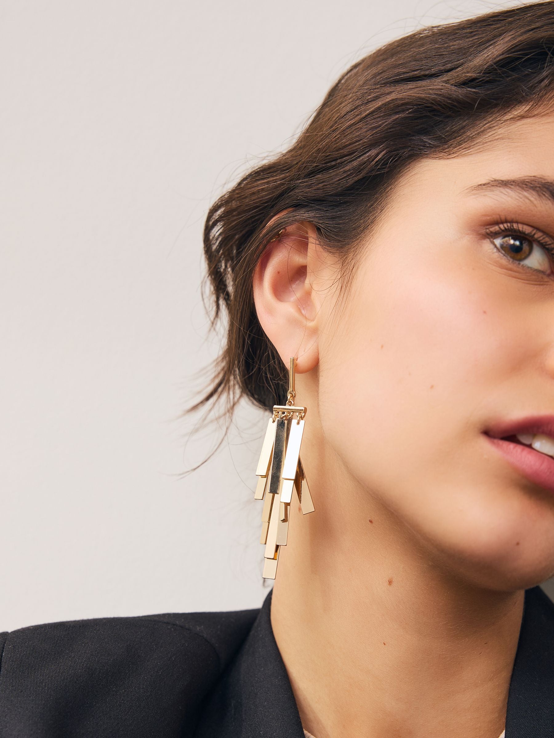 Gold tone fan cascade statement pierced earrings - British product