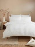 Serene white embossed grid duvet cover set (British brand)