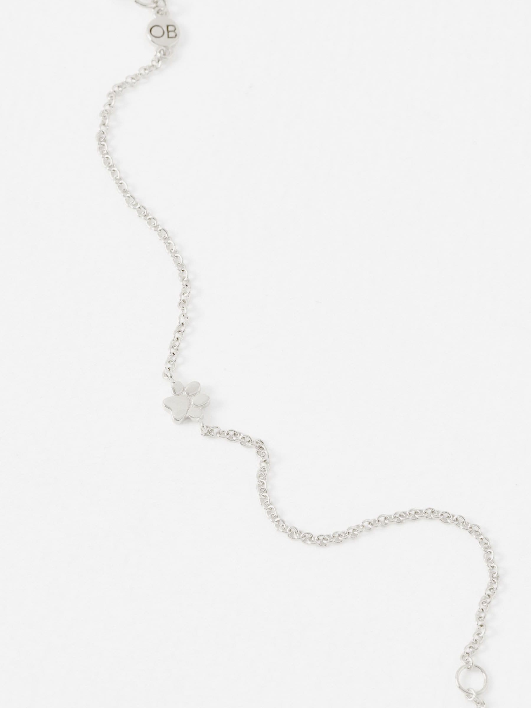 Oliver Bonas Milo Paw Print bracelet, imported from the UK