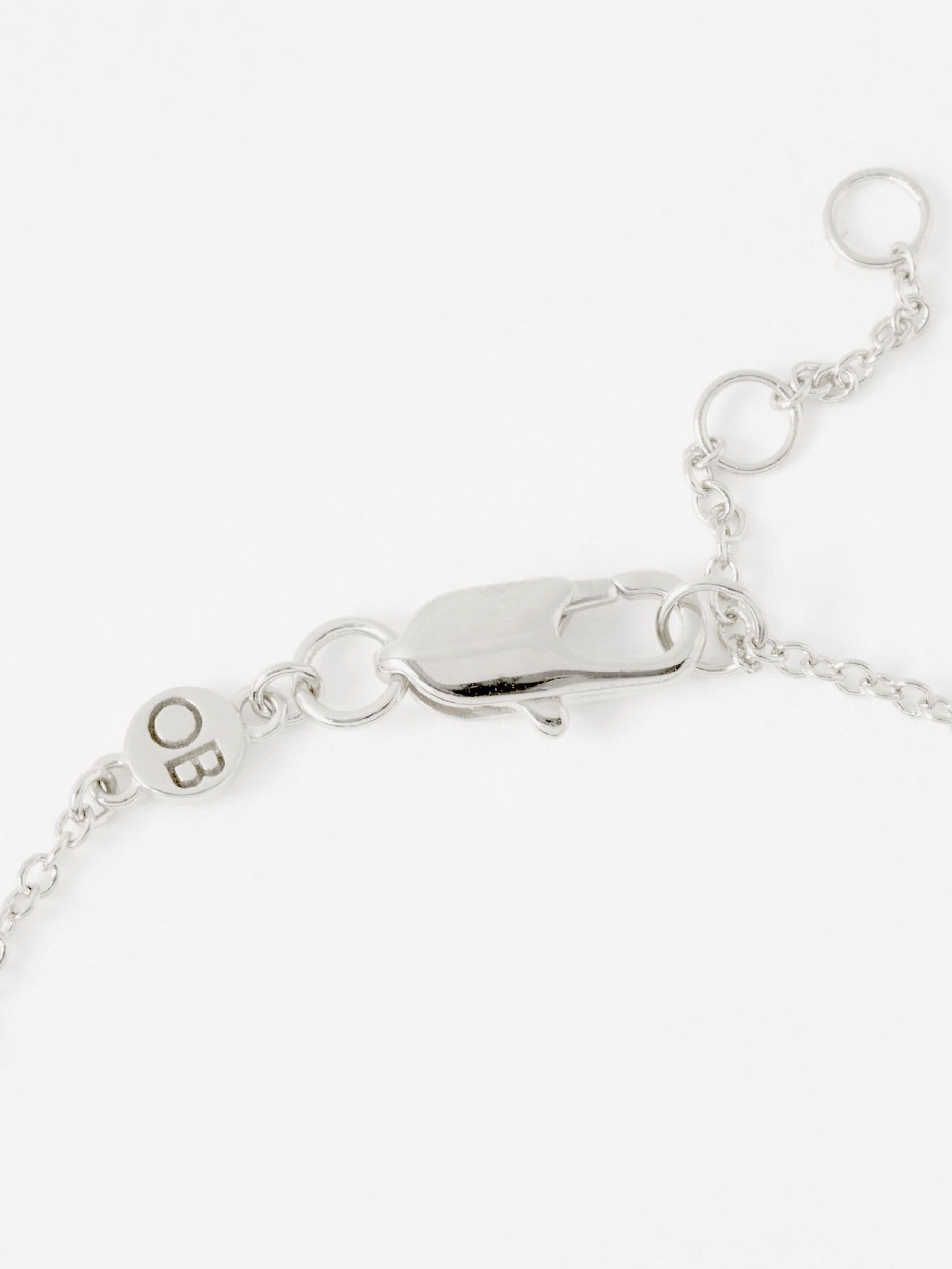 Oliver Bonas Milo Paw Print bracelet, imported from the UK