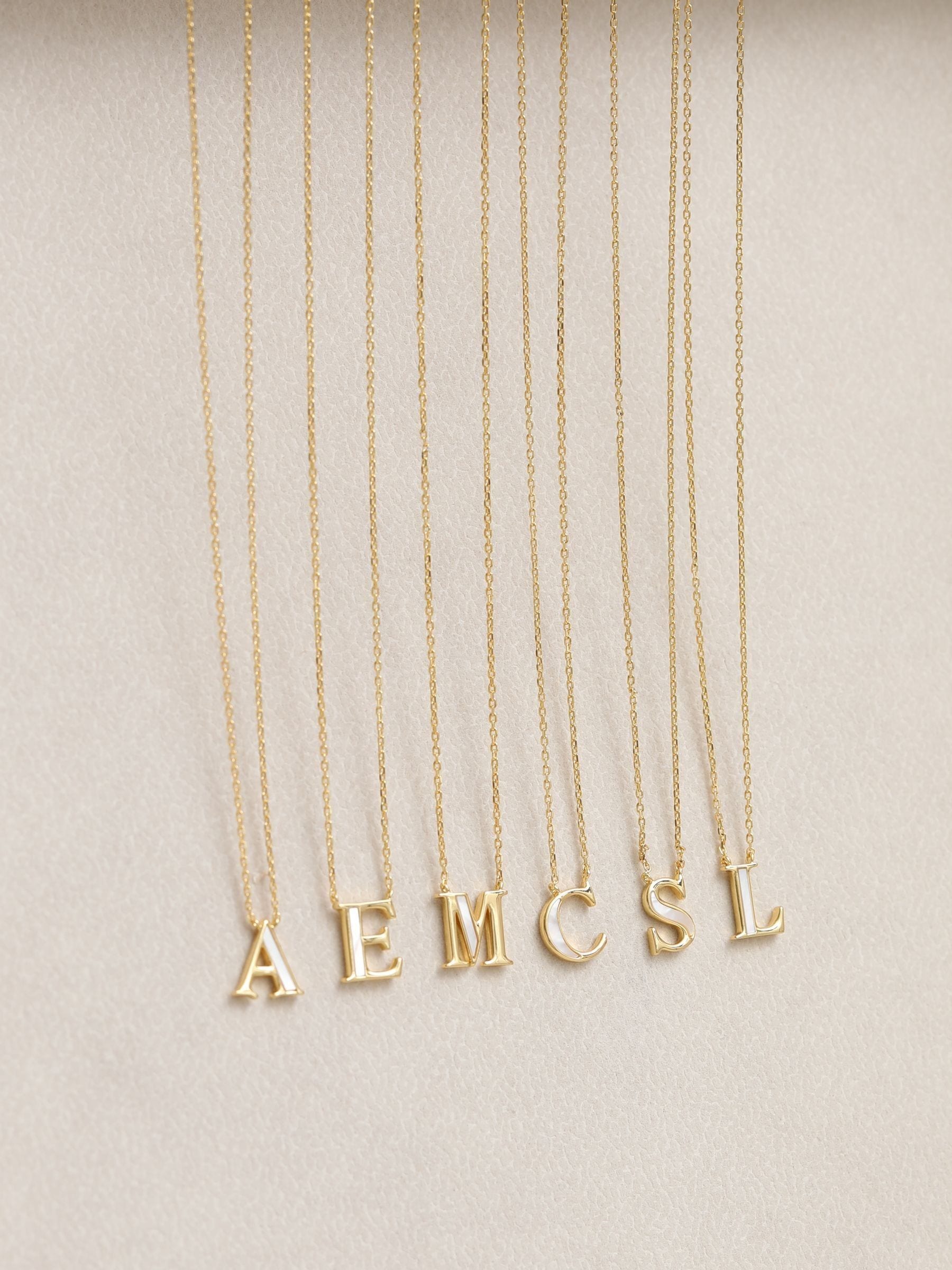 Inicio E Initial Pendant with mother-of-pearl and 17-inch chain, UK version