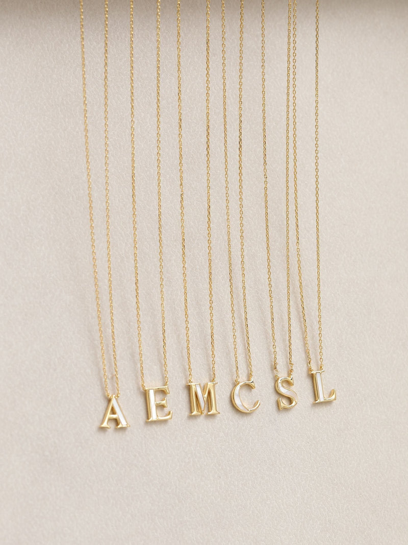 Inicio E Initial Pendant with mother-of-pearl and 17-inch chain, UK version
