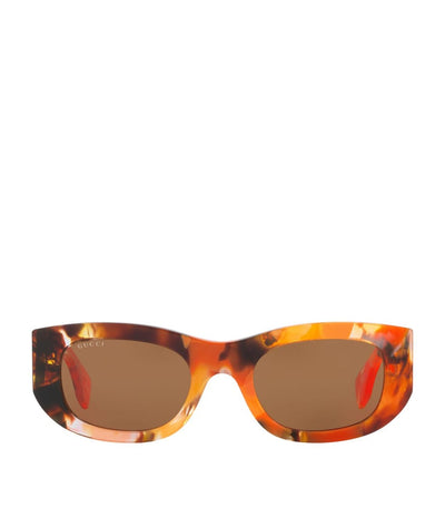 Oval Sunglasses with Tortoiseshell Frames and UV Protection