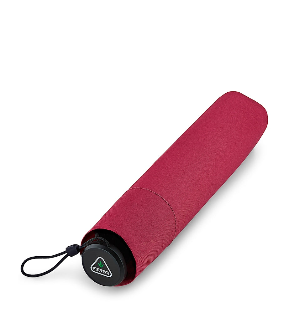 Compact telescopic umbrella by Fulton for travel and daily use - British product