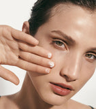 La Mer skincare set including moisturizing cream, lip treatment, and lip volumizer, UK version