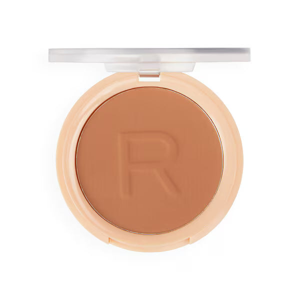 Revolution pressed powder makeup tan shade, imported from the UK