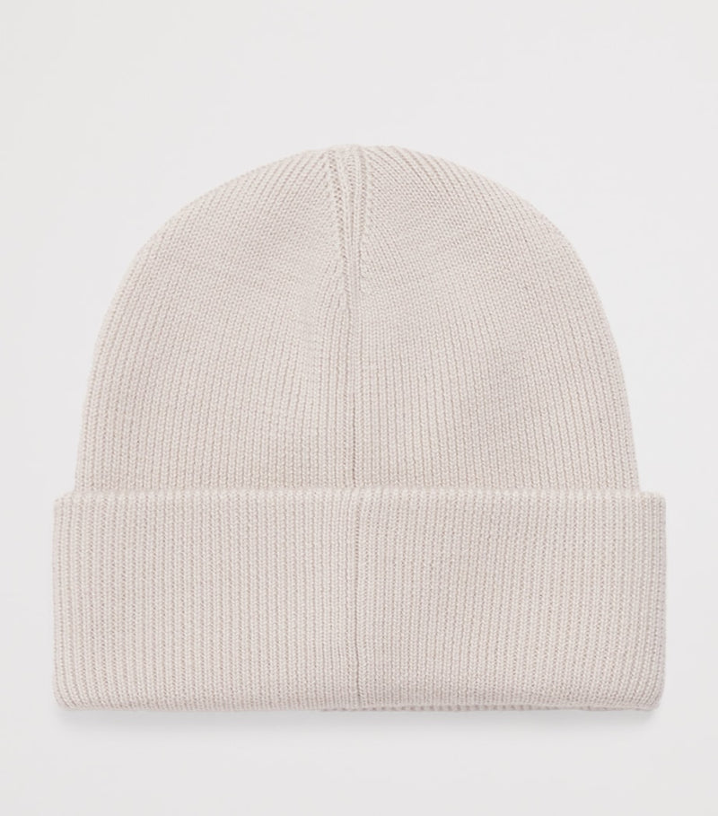 Moose Knuckles kids wool beanie with metal logo patch, imported from the UK
