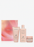 Radiant glow skincare gift set with gel cleanser, exfoliating tonic, and illuminating moisturiser, UK version