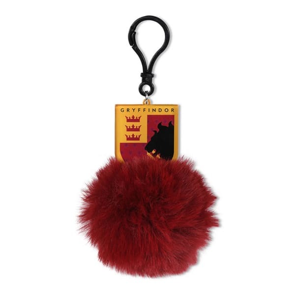 Material: Acrylic, Plastic. Height: 6cm. Width: 4.5cm. Design: Gryffindor, Motif, Pom Pom. 100% Officially Licensed. Fastening: Clip.